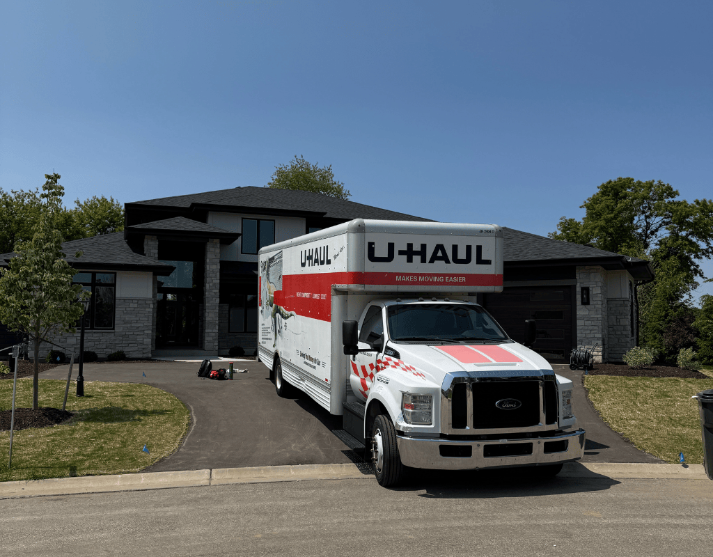 Haul Stars Moving branded truck parked outside a modern home ready for reliable apartment and condo moves in Greater Milwaukee