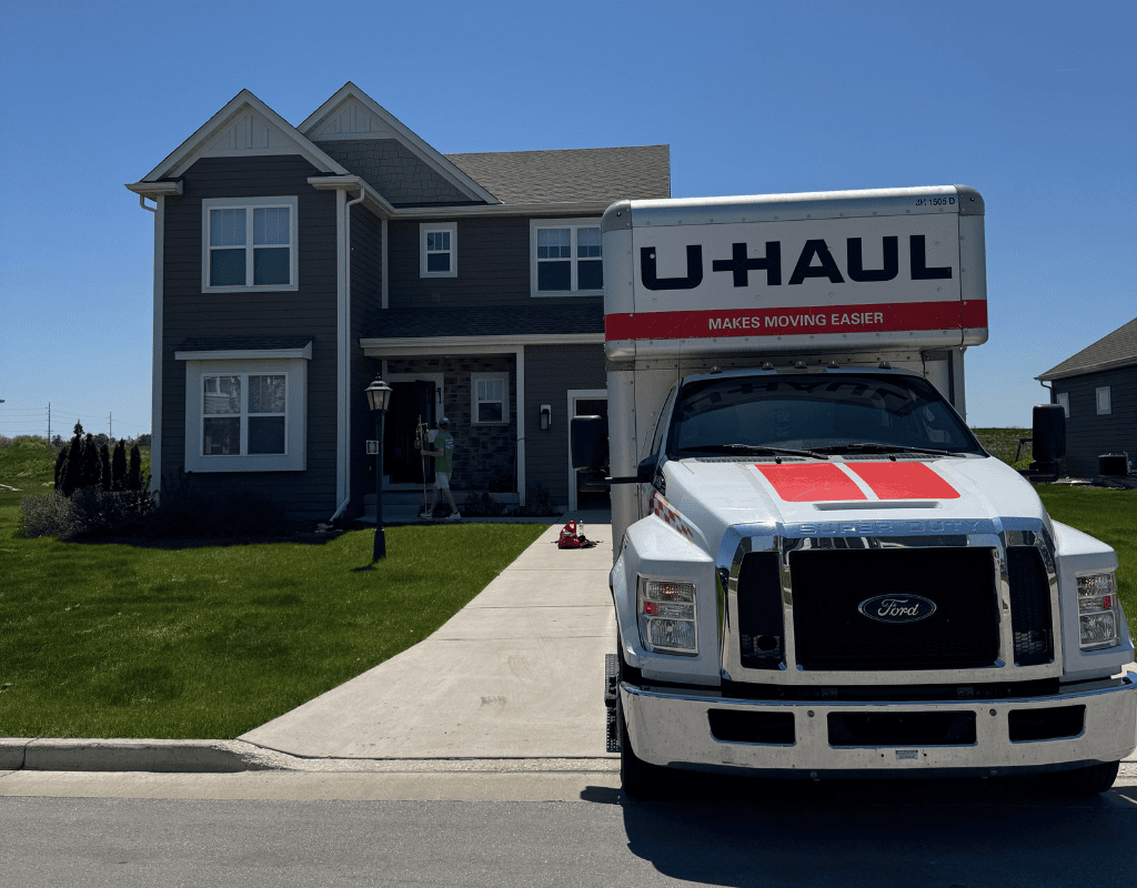 Haul Stars Moving truck parked outside a suburban Milwaukee house ready for a local relocation